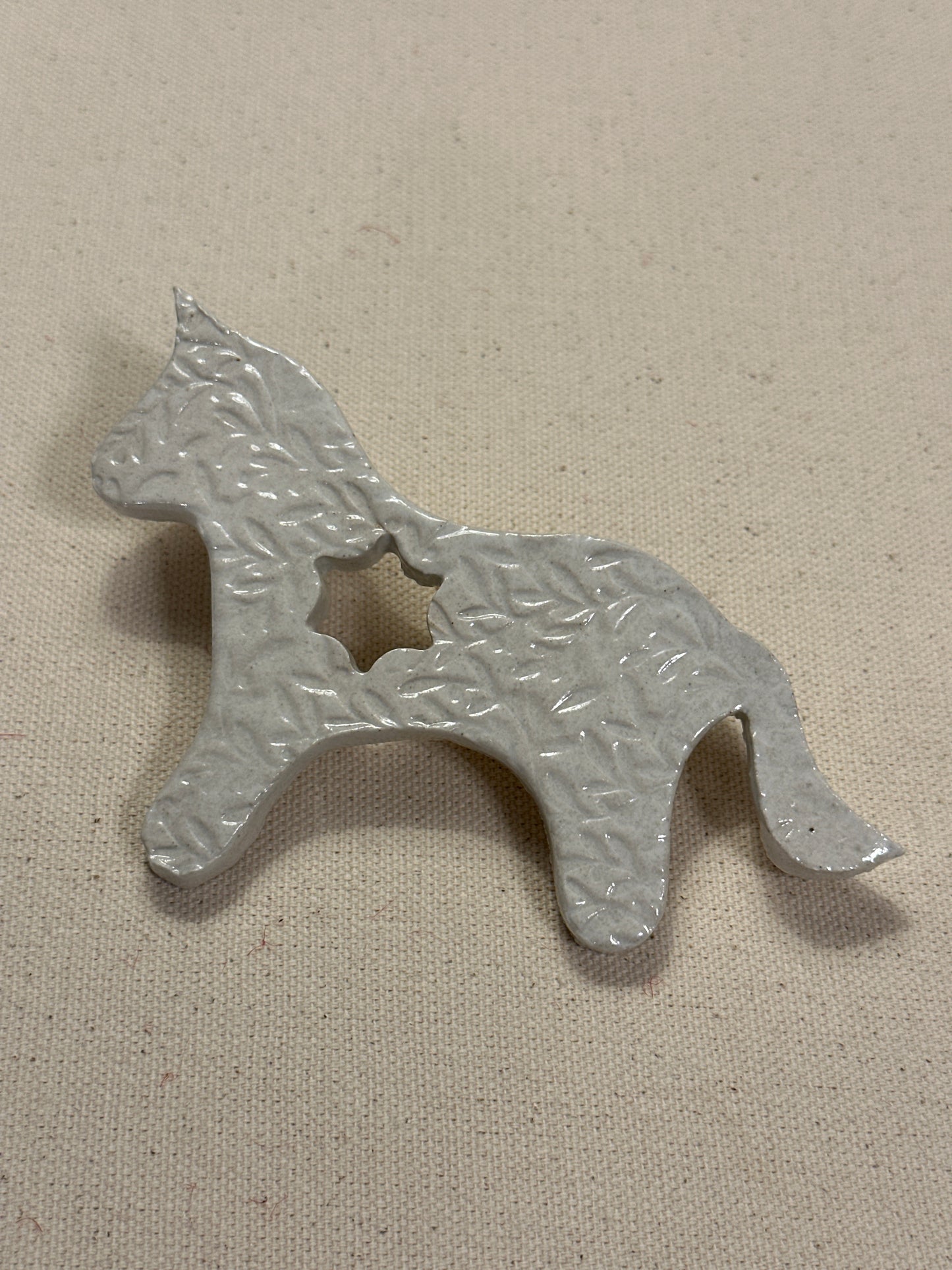 Embossed White Glazed Horse shaped ornament