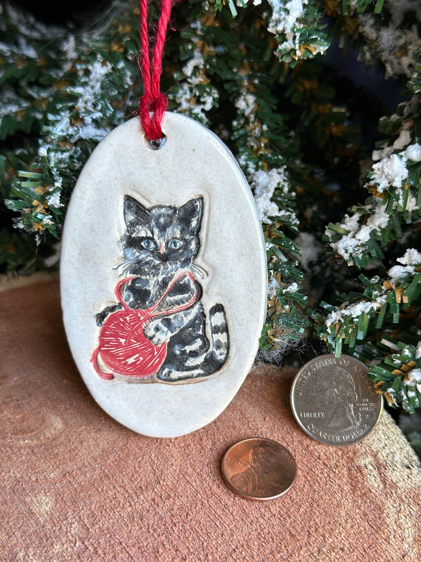 Cat with red yarn Christmas ornament